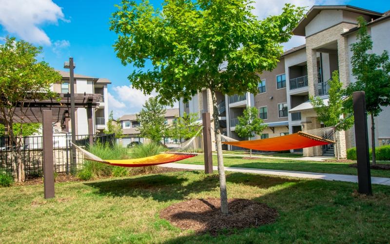 a courtyard with a hammock